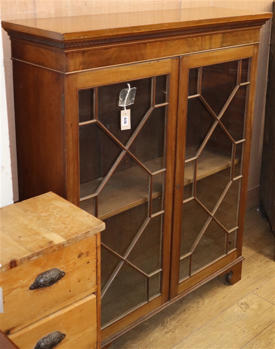 A George III style mahogany glazed bookcase W.110cm